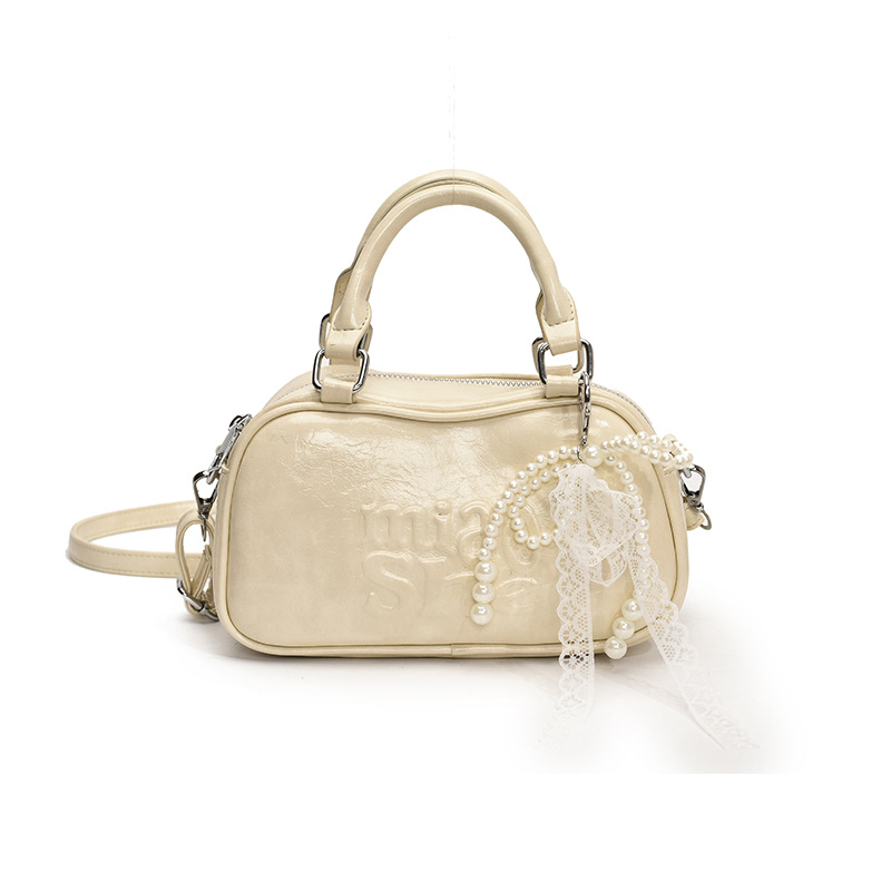 Versión coreana del bolso de bolos de mano para mujer 2025 nuevo bolso de hombro de moda de moda bolso de mensajero popular casual de todo fósforo