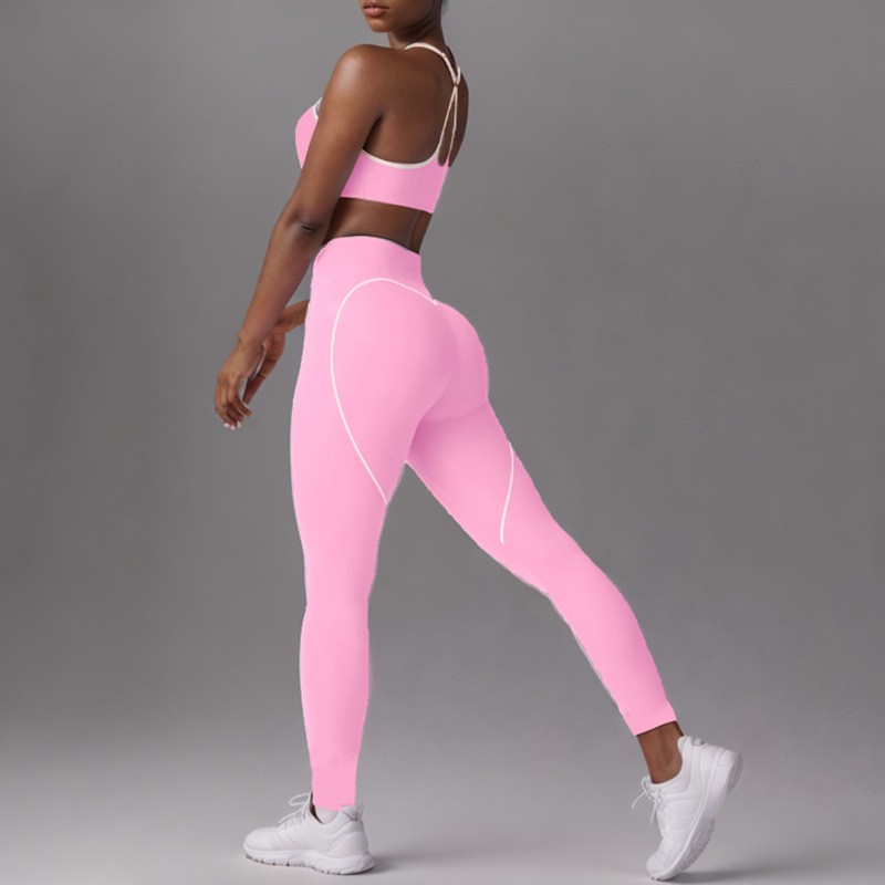 Procesamiento personalizado OEM comercio exterior europeo y americano transfronterizo belleza espalda deporte contraste color sujetador melocotón cadera alta cadera elástica pantalones de yoga