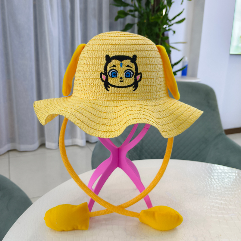 25新款兔耳朵敖丙气囊儿童草帽夏季出游捏耳朵会动草编遮阳帽批发