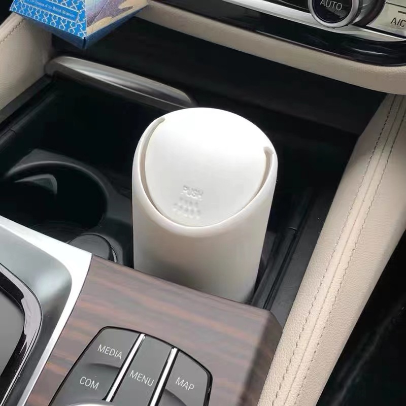 Basura de automóvil de moda creativa desmontable lavable silicona mini contenedor de basura de automóvil taza de agua de automóvil rack