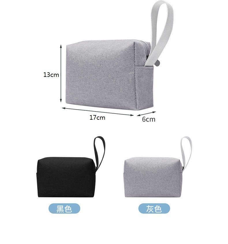 Cross-border in-stock hand-held toiletry bag 300D cationic waterproof cosmetic bag Oxford cloth storage notebook power bag undefined
