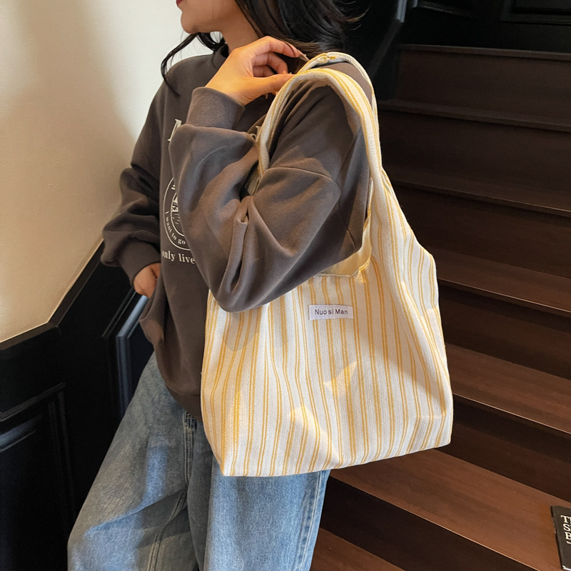 Bolso Tote de moda coreana 2025 nuevo bolso de lona estilo azul marino a rayas bolso de hombro con letras casuales