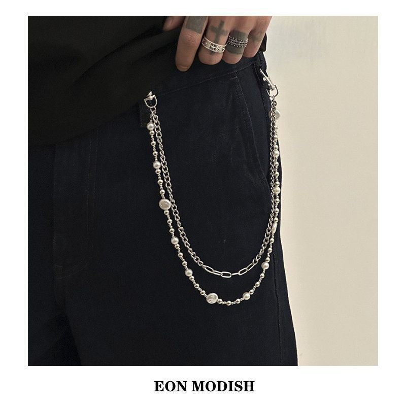 Eon Modish high-end hip-hop cross-border couple's denim pants with pearl patchwork and chain detailing Eon Modish high-end hip-hop cross-border couple's denim pants with pearl patchwork and chain detailing