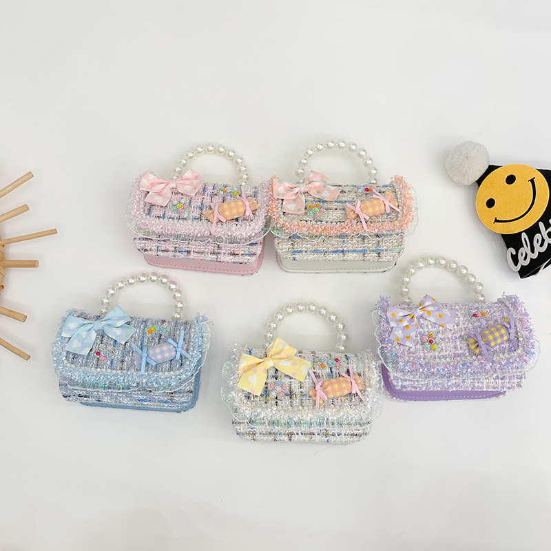 Nuevo bolso de mensajero de La Niña de los niños niña estilo de Chanel estilo occidental Linda niña linda de dibujos animados portátil pequeña bolsa