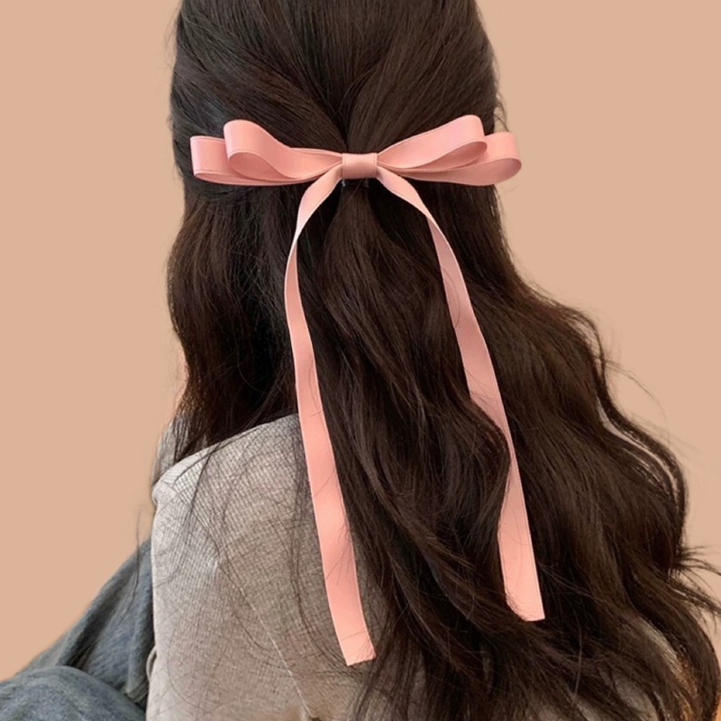 Розовая заколка для волос с бантиком
