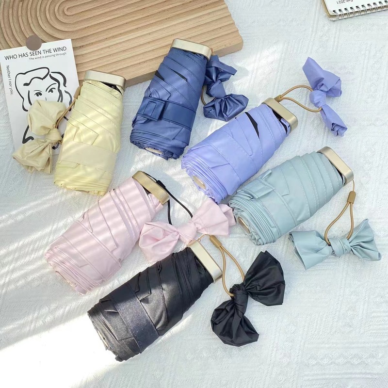 女性用日傘、日焼け止め、コンパクトでポータブルな日傘、女性用晴雨兼用傘、カプセル、小さな新鮮なビニール日傘|undefined