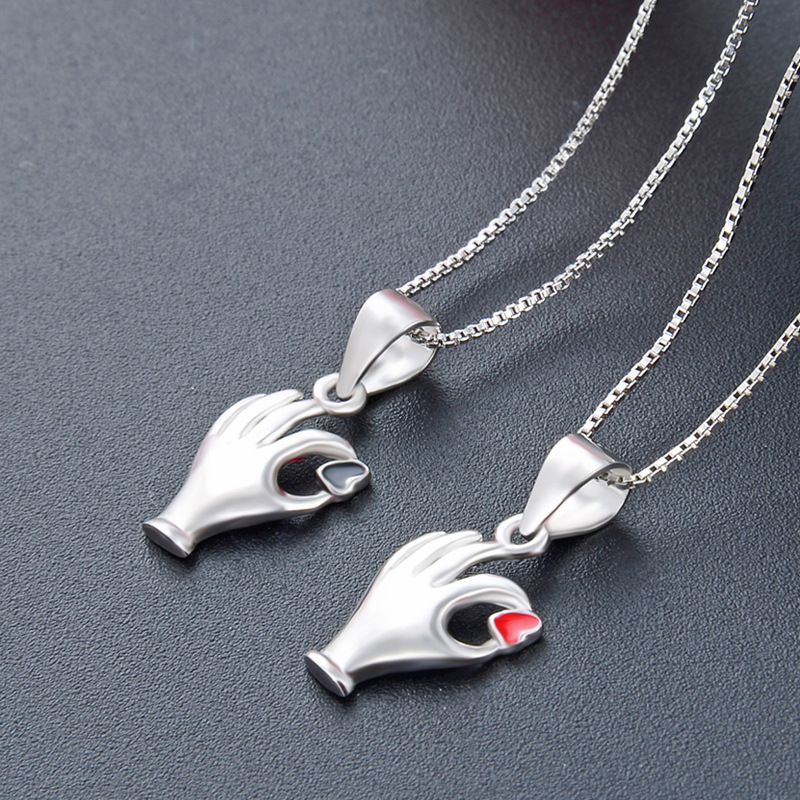 S925 plata esterlina gestos ok colgante nicho diseño pequeño amor colgante de plata estudiantes colgante de dinero al por mayor