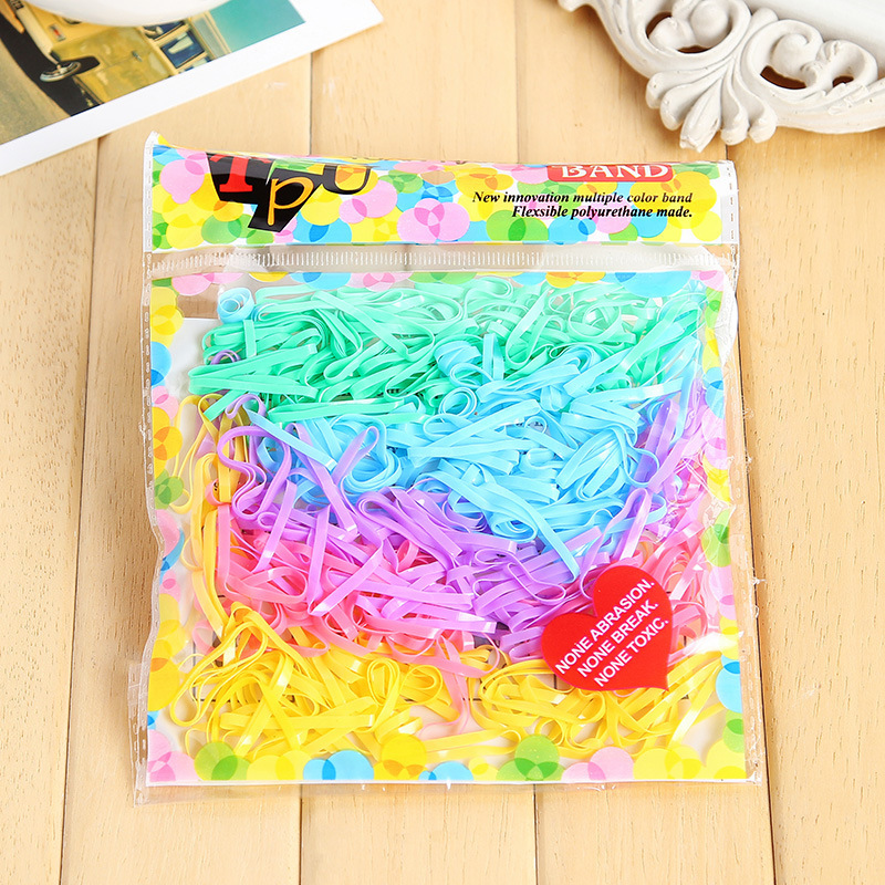 Las bandas de goma desechables de color para niños no dañan el cabello, alta elasticidad y durabilidad