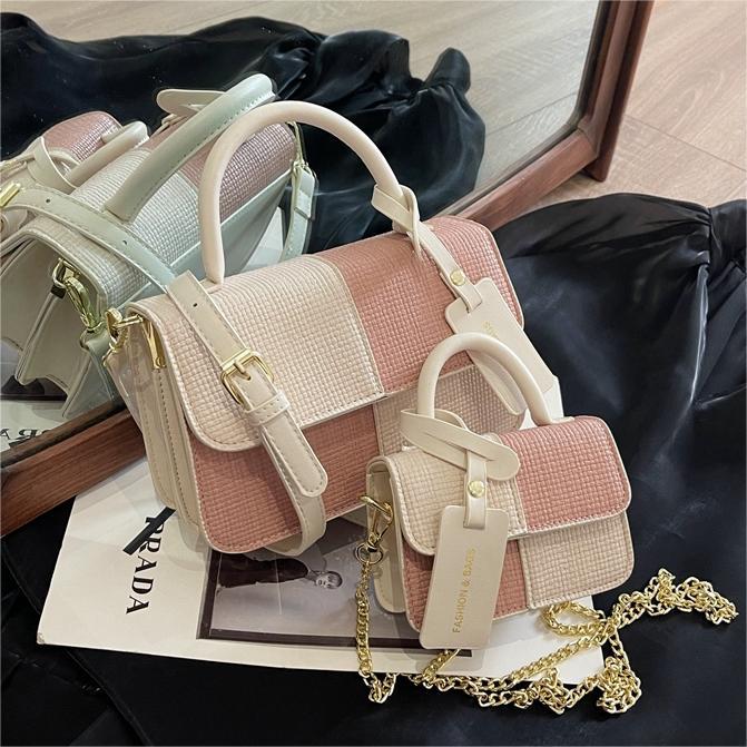 Bolso de mano coreano de contraste de color para mujeres 2024 primavera y verano nuevo bolso de moda universal bolso pequeño de nicho textura mochila