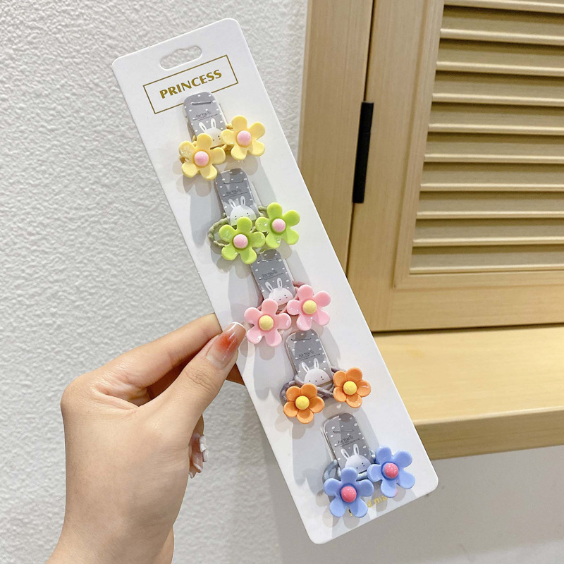 Los niños de la banda del pelo del bebé de la historieta no lastiman la banda de goma del pelo de la niña volumen del pelo menos cuerda del pelo del bebé