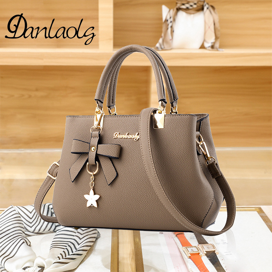 [Productos de Guangzhou] bolso de mujer de gran capacidad otoño 2025, bolso de boda con lazo de alta calidad para mujer