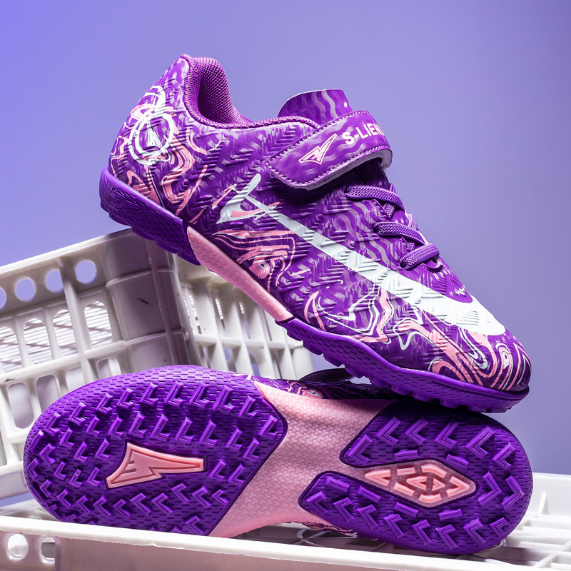 Zapatos de fútbol transfronterizos de alto perfil para hombres TF zapatos de entrenamiento antideslizante transpirables para niños zapatos deportivos profesionales para estudiantes