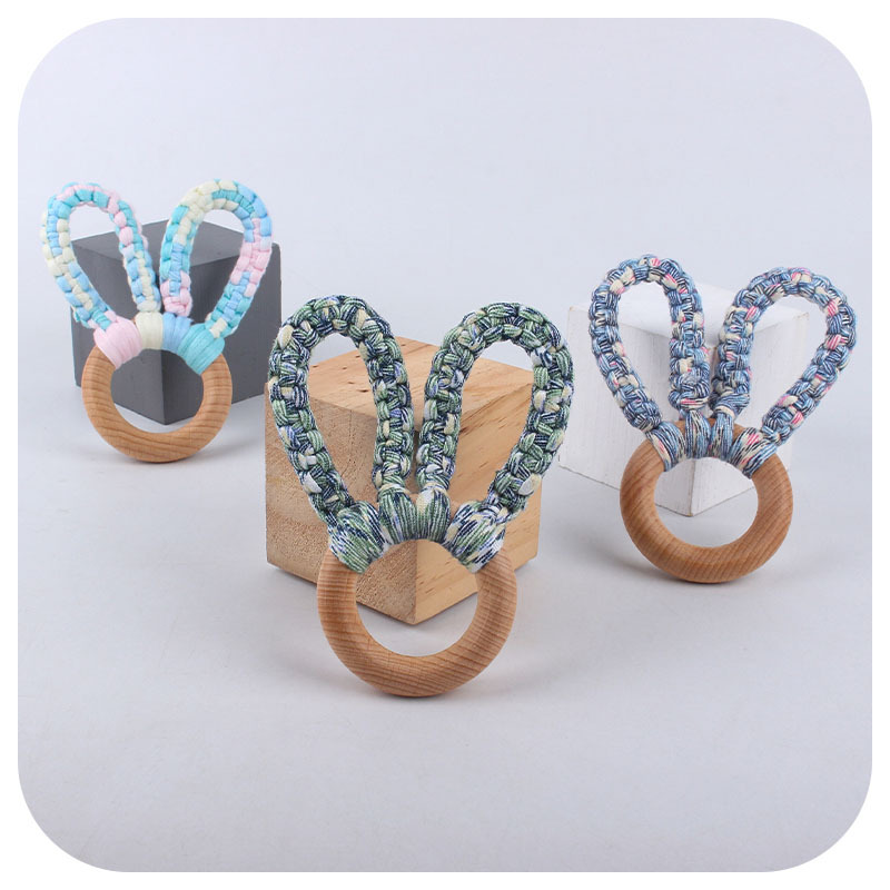DIY bebé creativo Haya Orejas de conejo mordedor pulsera tejida a mano de algodón cuerda juguete dientes de bebé palo de molienda