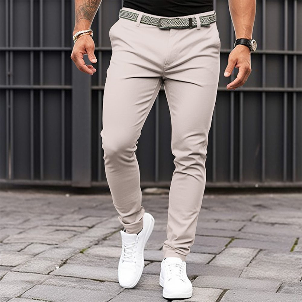 Europa y América estación independiente transfronteriza de los hombres de color sólido bolsillo apretado cremallera negocio casual slim fit pantalones pequeños