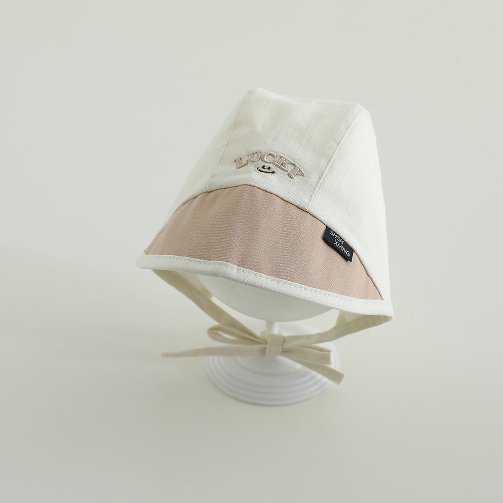 Sombrero coreano para bebés primavera y otoño delgado lazos letras baojou sombrero de corte sombrero de sombrero de abrigo recién nacido puerta de chimenea sombrero de marea