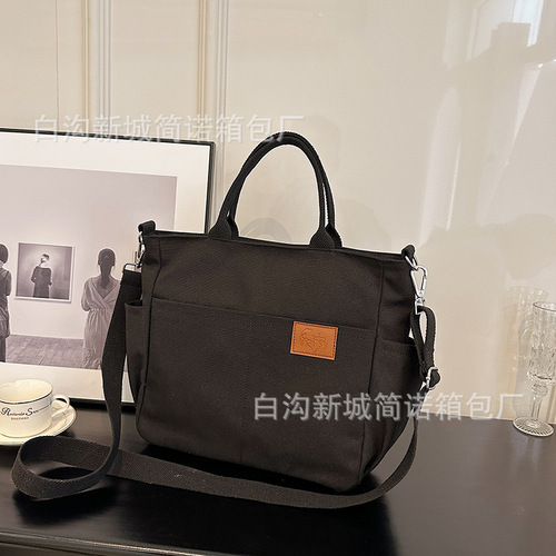 Cross-border new large capacity canvas bag, shoulder and crossbody bag for women, retro hand-held shoulder bag, fashionable and versatile tote bag