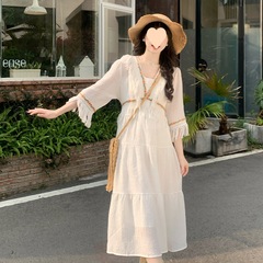 Bohemian embroidered tassel dress for women 2025 spring new ethnic trend Yunnan travel suspender two-piece set