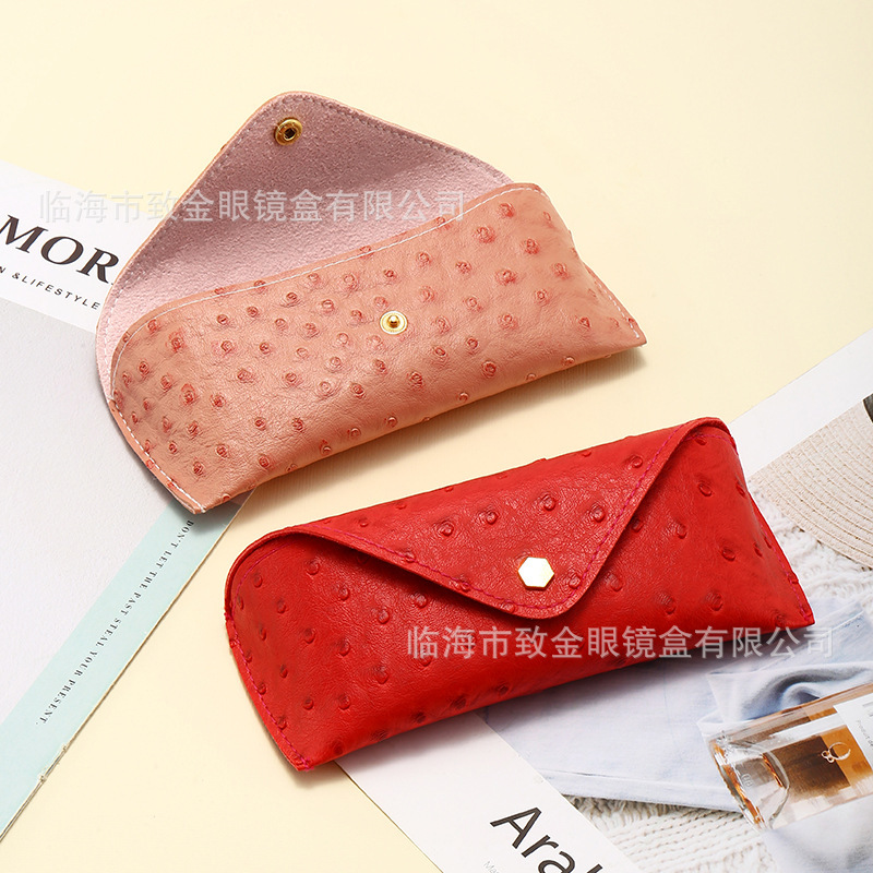 Factory wholesale portable five-color ostrich pattern glasses case personality nail buckle PU leather trendy sunglasses soft bag