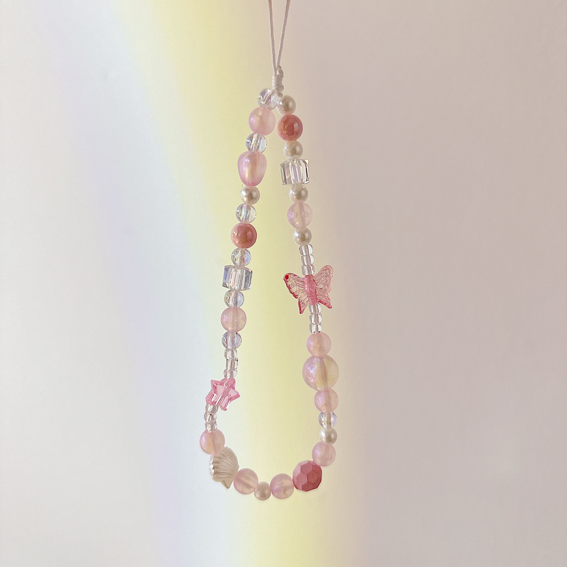 Cadena aplicable nicho mariposa corta cadena de muñeca arco cuentas de caso de teléfono móvil colgante tipo correa de muñeca anti-pérdida