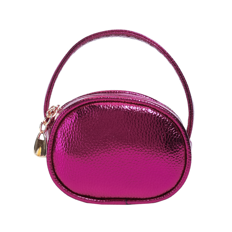 Bolso de mano de niña láser brillante simple color sólido mini bolso de cambio de bebé coreano nuevo bolso infantil transfronterizo