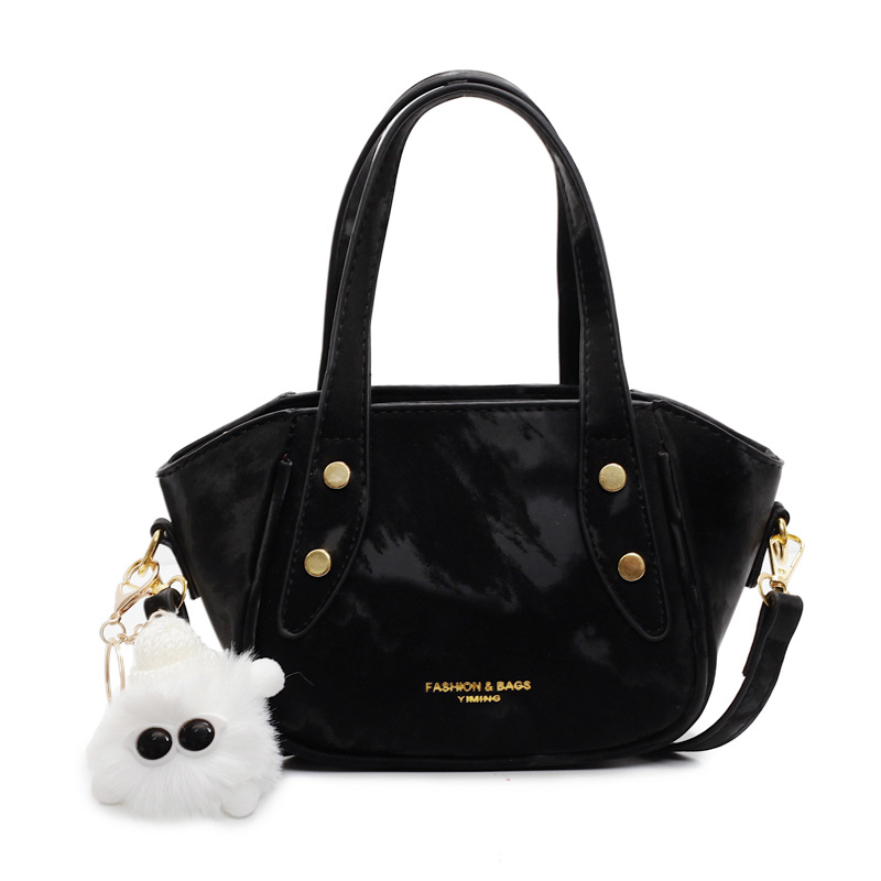 Nicho de diseño de tendencia bolso de cubo de mano mujer 2025 nueva moda bolso de hombro de estilo extranjero para trabajar bolso de transporte