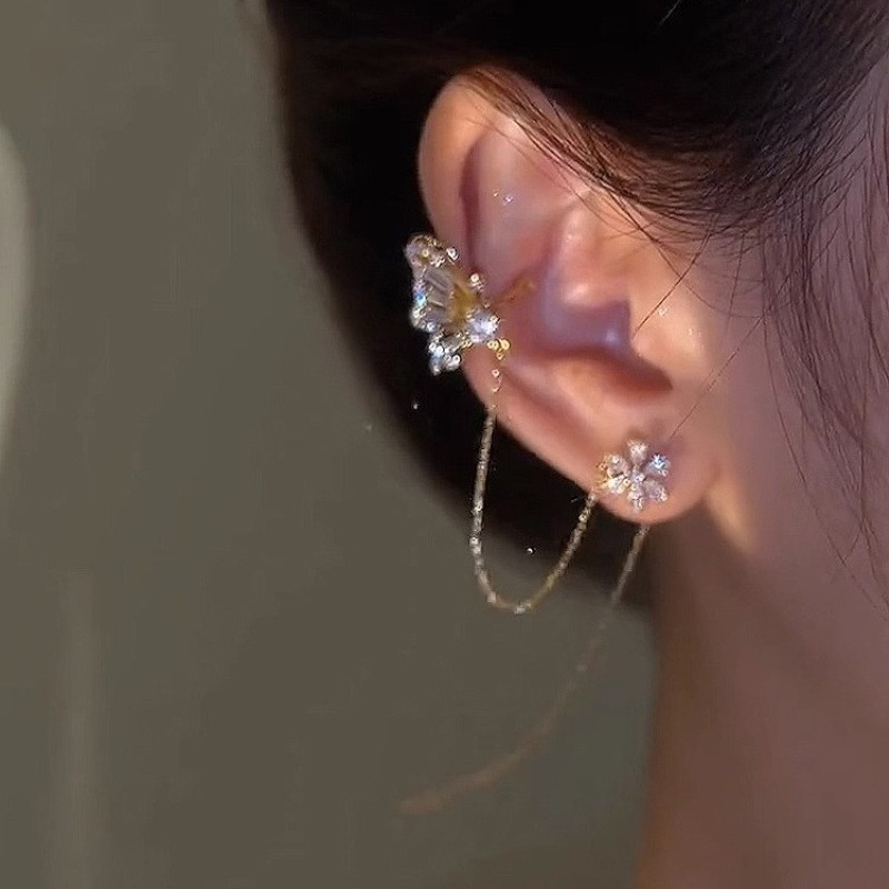 Mariposa amor flor oído hueso clip oreja línea integrada pendientes nicho diseño de alto grado de luz de lujo clip de oreja temperamento borla pendientes