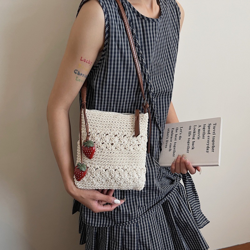 Bolso tejido de moda coreana 2025 verano nuevo bolso femenino bolso de vacaciones junto al mar bolso de mensajero de playa de moda marea