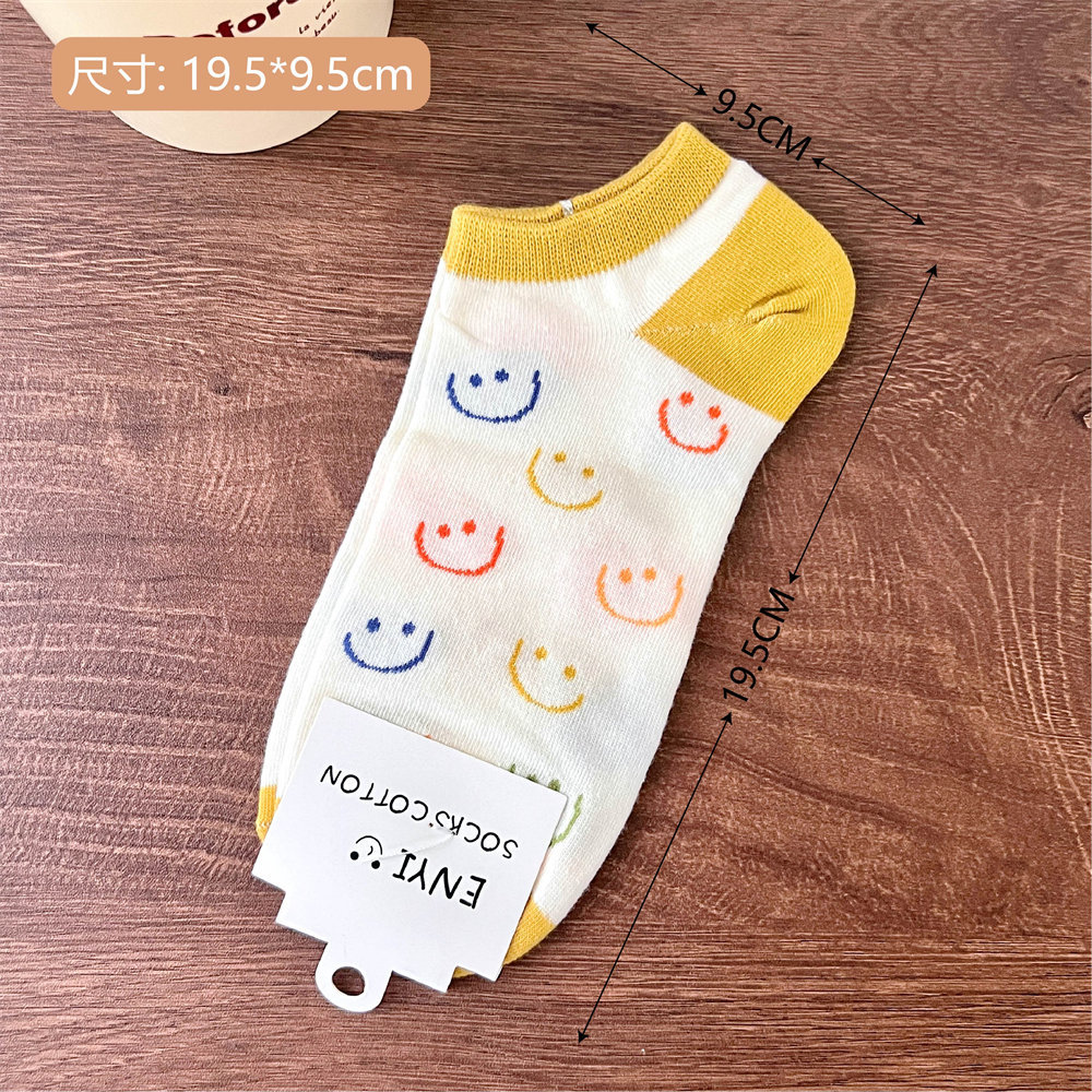 2 # Un par de calcetines Smiley amarillos