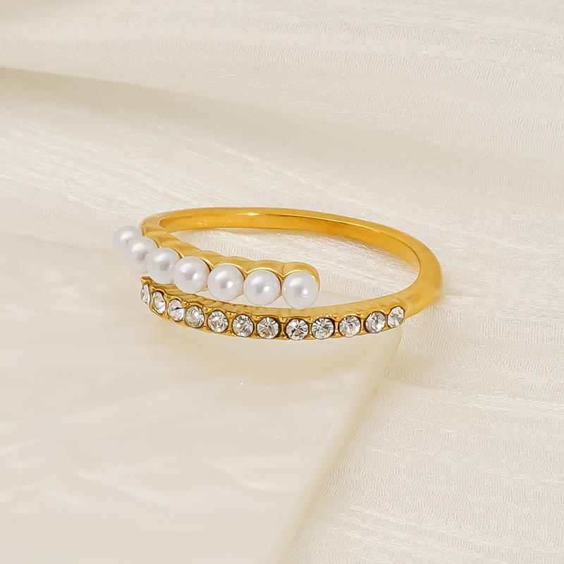 Japón y Corea del Sur nuevo tipo geométrico cruz oro INS viento temperamento ligero lujo con incrustaciones de perlas anillo de ajuste de apertura mujer