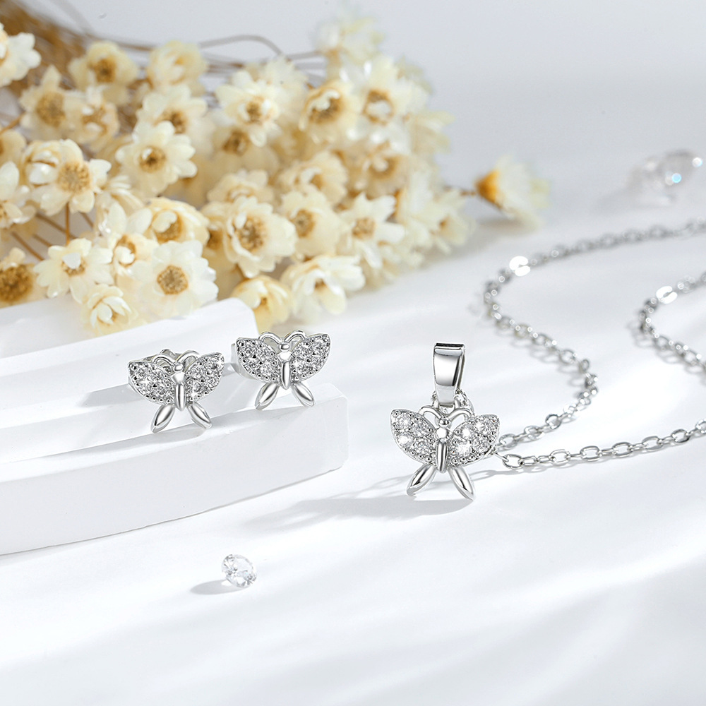 Nicho de moda mariposa conjunto de joyería para mujeres 14K oro zircon colgante mariposa pendientes venta caliente transfronteriza