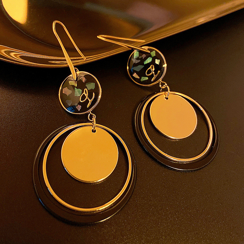 Metal geometric circle hollow out long niche design, fashionable earrings, simple and high-end style earrings_voghion.com