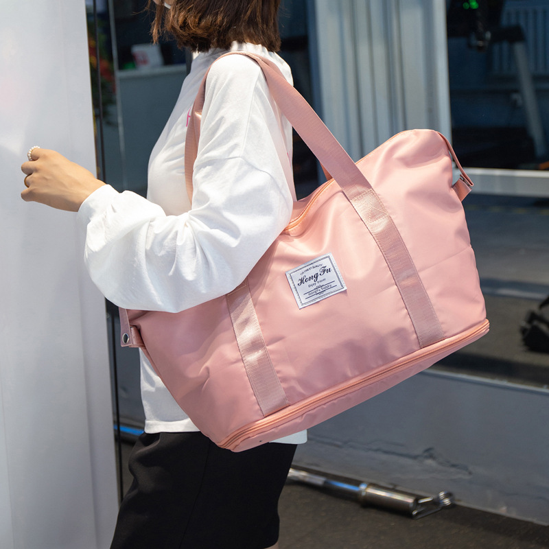 Bolsa de viaje de corta distancia portátil de gran capacidad bolsa de equipaje impermeable de moda para mujer bolsa de embarque de almacenamiento de viaje para hombres