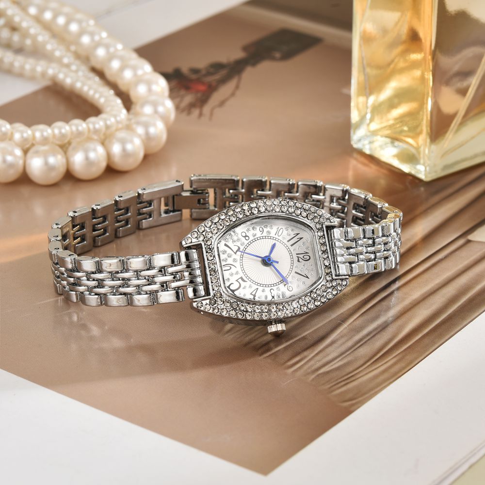 Comercio exterior nuevo estilo retro ovalado reloj de pulsera para mujer estilo premium ins simple reloj de cadena de estudiante de moda blanca