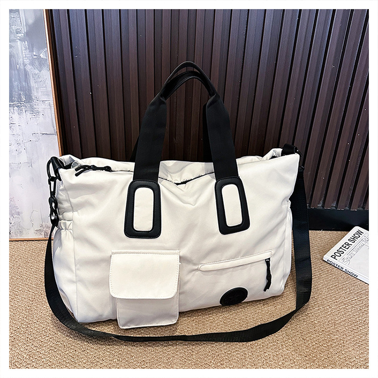 大容量の短距離旅行バッグ、軽量収納フィットネスバッグ、スポーツ軽量ショルダーバッグ、女性用カジュアルで多用途なハンドバッグ