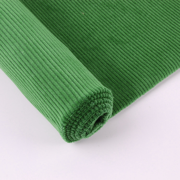 Venta caliente 14 Wale elástico de algodón de color sólido elástico tela de ropa de tercienda