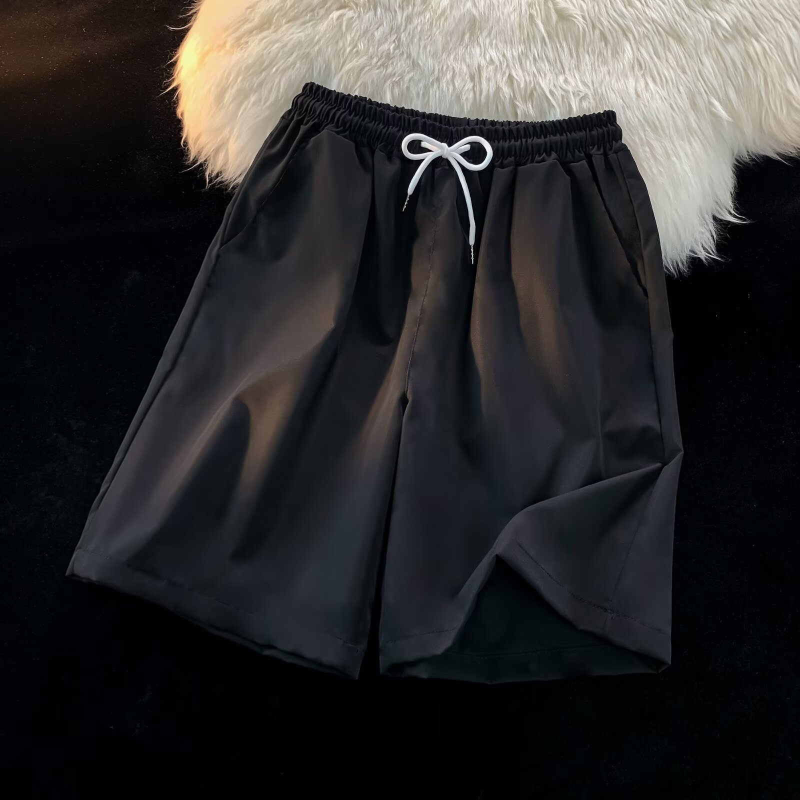 Personalizado al por mayor caramelo de viento neutro multicolor 25 colores primavera y verano nuevos pantalones cortos casuales de cinco puntos sueltos y cómodos