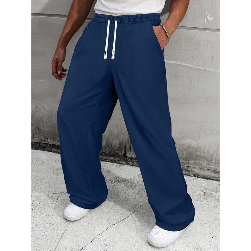 Pantalon de survêtement homme uni à jambes larges, coupe ample et décontractée, cordon de serrage, style sportif, jambes droites._voghion.com