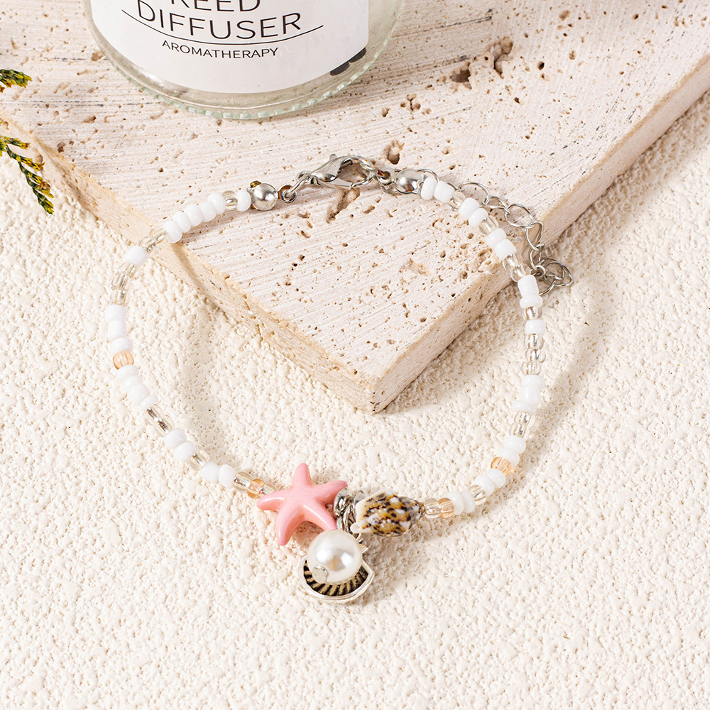 Bracciale con perline e stella marina gioiello da spiaggia_voghion.com
