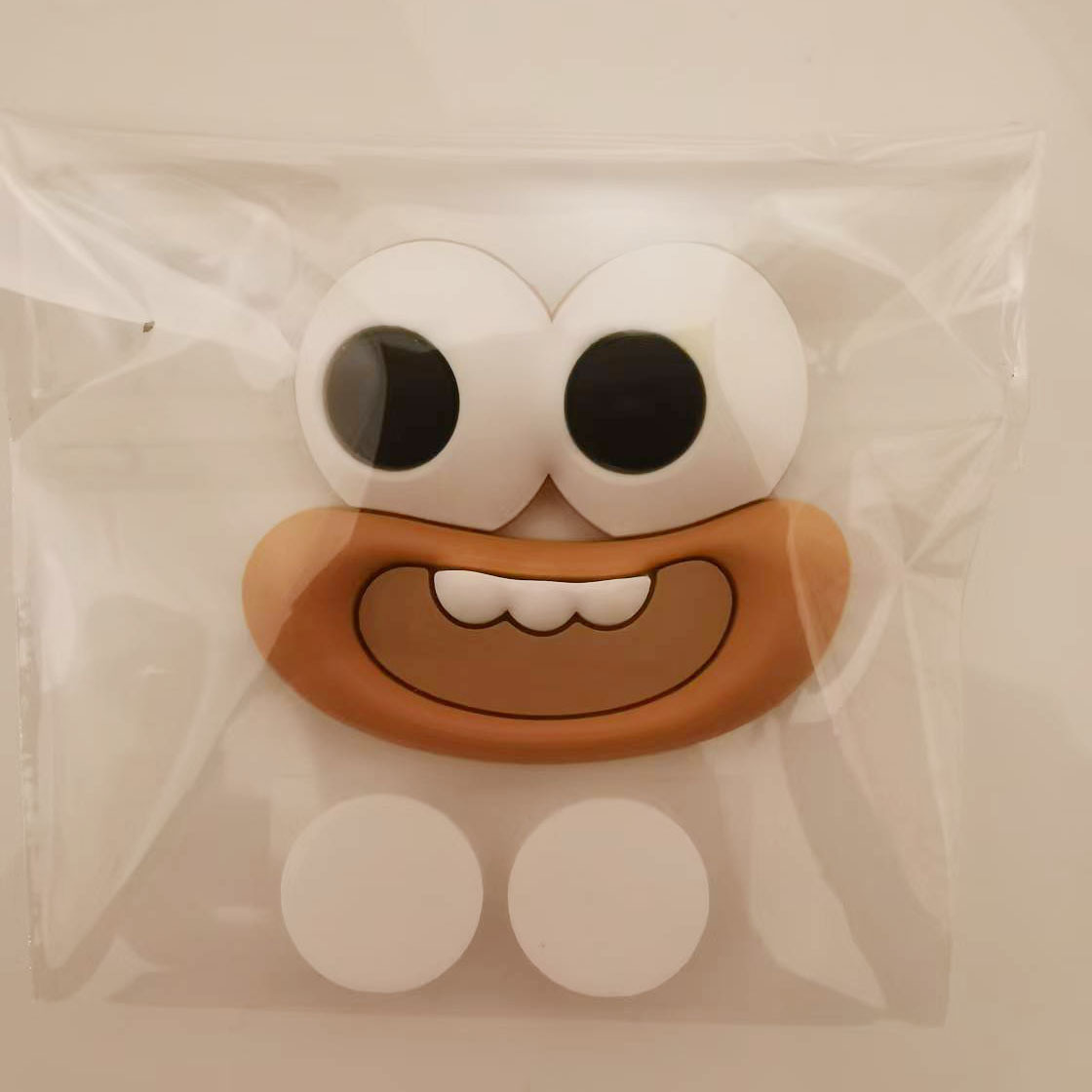 Brown toothy mouth+glue individually packaged
