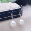 Fashionable earrings from pearl, silver 925 sample