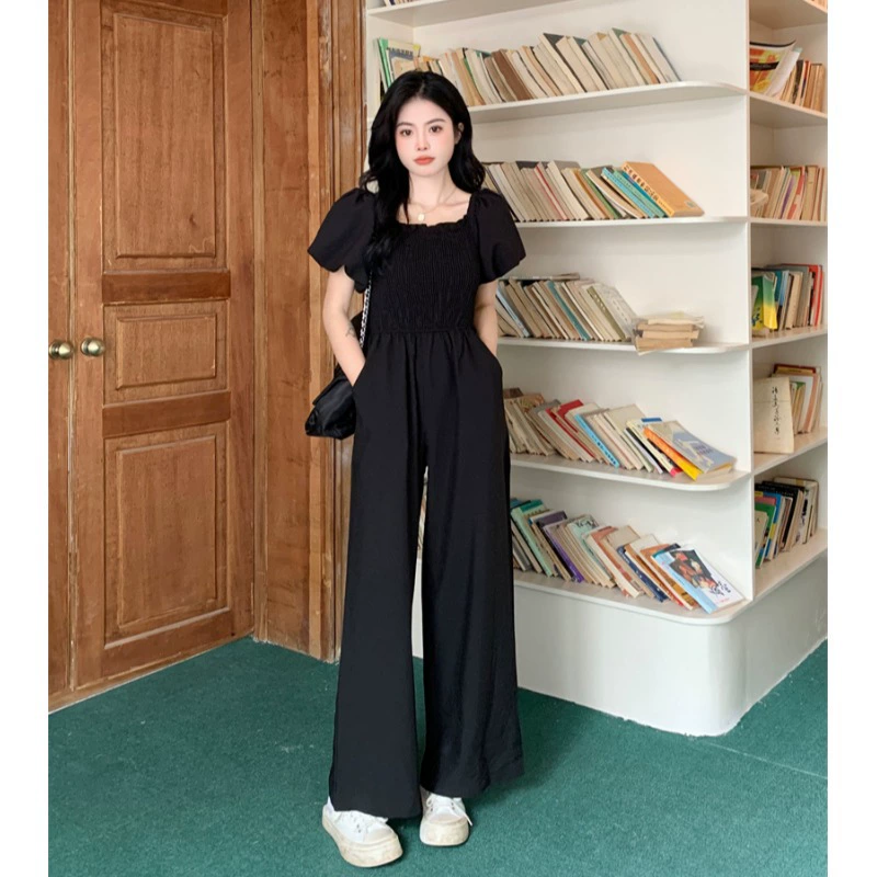 Повседневный женский комбинезон больших размеров, стильный новый летний стиль 2025 года для женщин больших размеров, черные широкие брюки с облегающим талией и утягивающим эффектом.