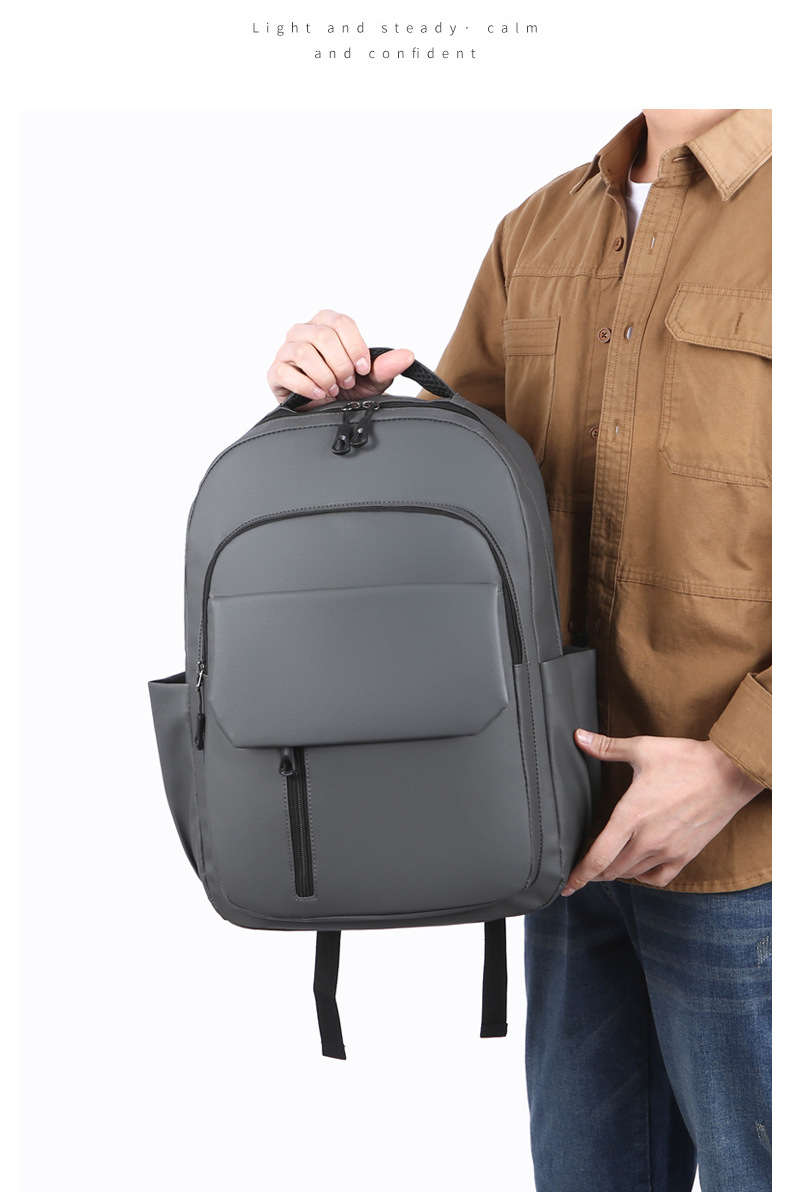 Wholesale of in-stock commuting and business backpacks for men, simple and large-capacity USB charging laptop bags, and student schoolbags undefined