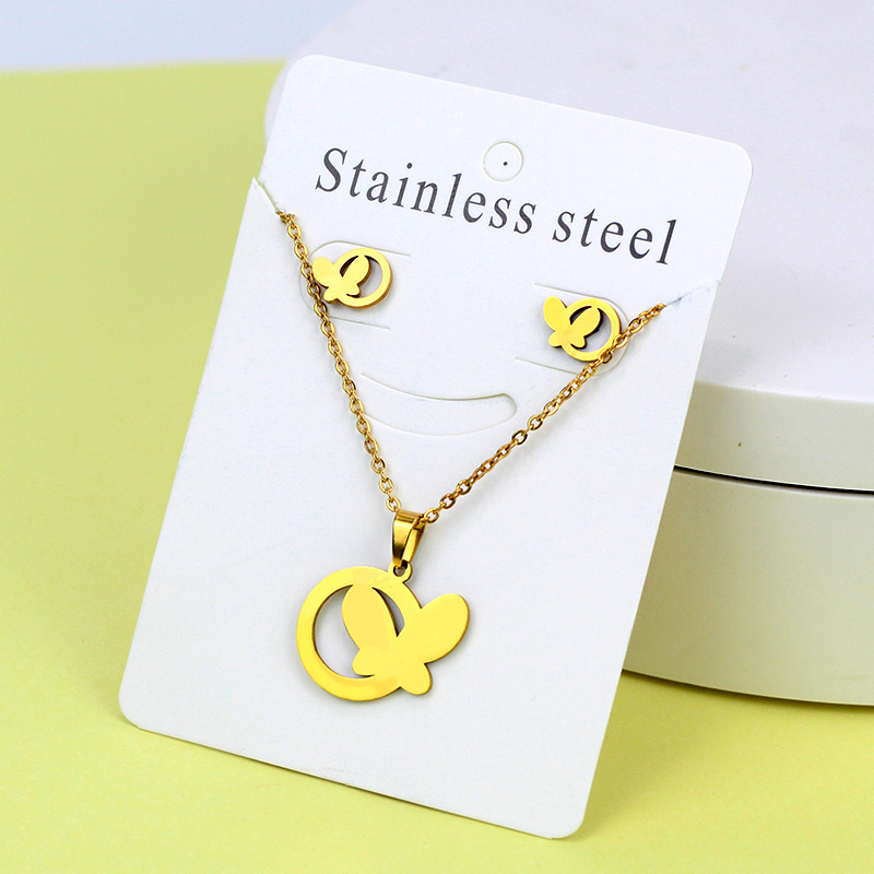 Conjunto de collar de pendientes de oro de acero inoxidable europeo y americano, collar de mariposa de amor de diamante, colgante, cadena de clavícula, fábrica al por mayor