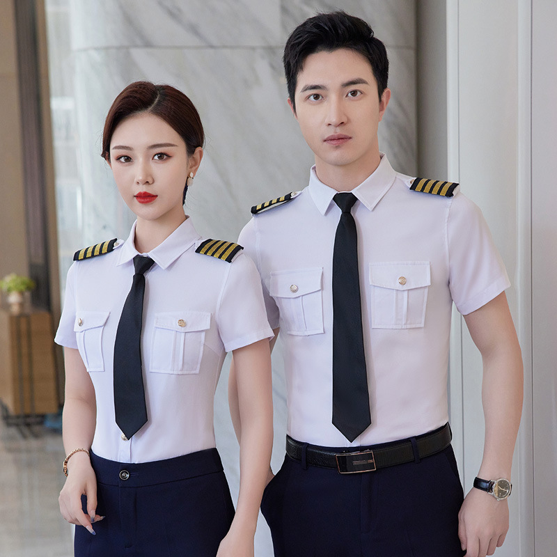 半袖の男女のシャツの青いシャツのスチュワーデスの空の少ないパイロットの機長の航空制服の警備員の作業服