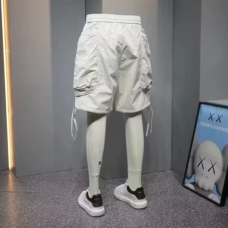 Moda 2024 nuevo estilo herramientas recto casual hombres sueltos de verano pantalones de moda sueltos control de imagen de fondo blanco