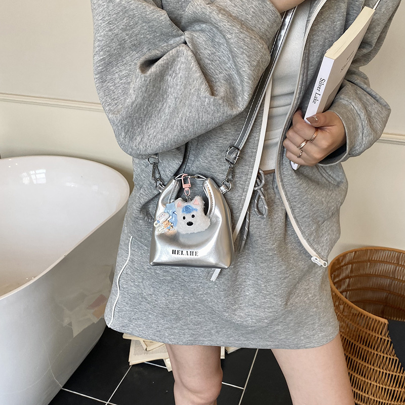 Bagos para niños otoño y invierno nuevo retro mini bolso de mano de piel de aceite lindo perro bolso de media luna auriculares lápiz labial bolso de mochila