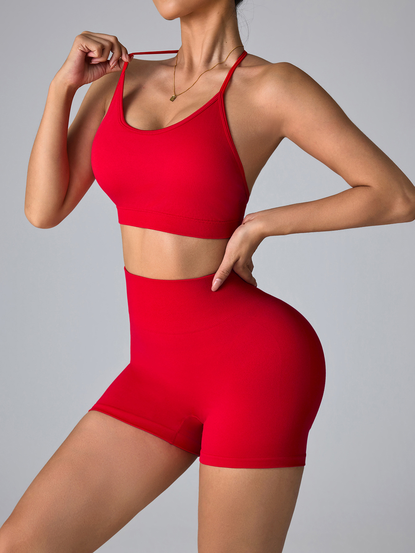 Traje de ropa de yoga de fitness sin costura europea y americana, sujetador deportivo con cuello halter, hermosa espalda, melocotón, cadera, caderas, pantalones cortos de yoga de cintura alta