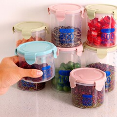 透明なプラスチックの密封の缶の食糧の乾燥した果物の五穀の雑穀のプラスチックの貯蔵の缶は食べ物の収納の缶の収納の箱を掛けます。