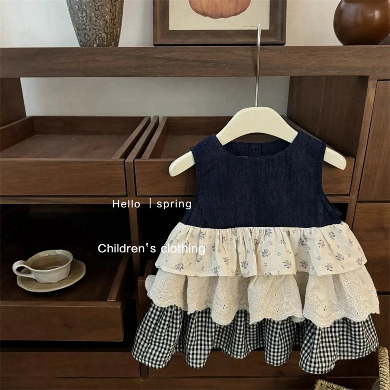 Xianning Seven Girls Baby Summer New Products Falda de chaleco sin mangas Falda de mezclilla con costuras a cuadros florales Falda de pastel apilada