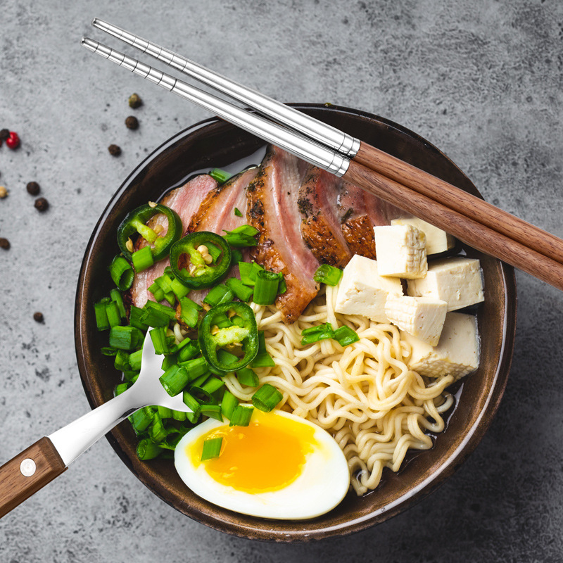 Cuchillo y tenedor de acero inoxidable de comida occidental 304 engrosado Hotel regalo traje cuchara y tenedor mango de palo de rosa transfronterizo